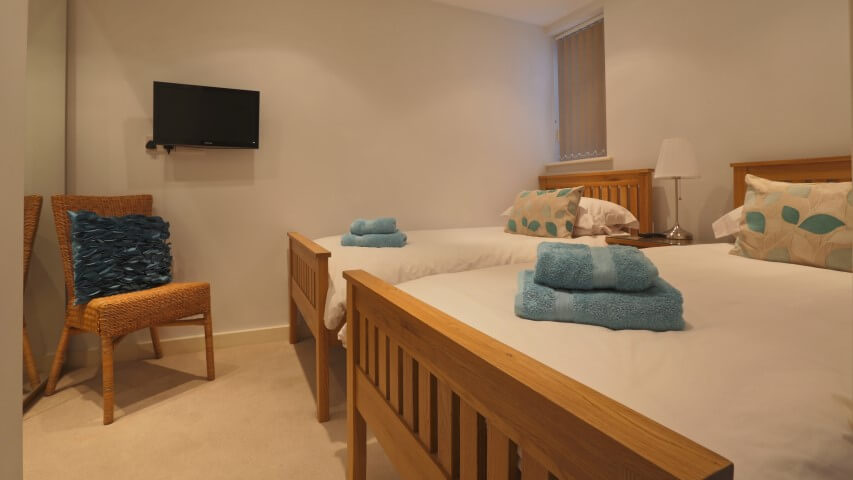 Twin bedroom at Fistral Blue apartment, Newquay